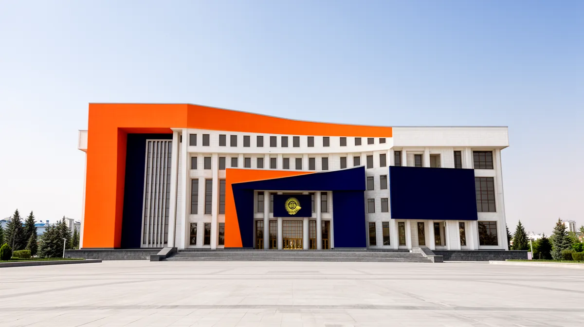 Bâtiment gouvernemental moderne avec façade orange et drapeaux.